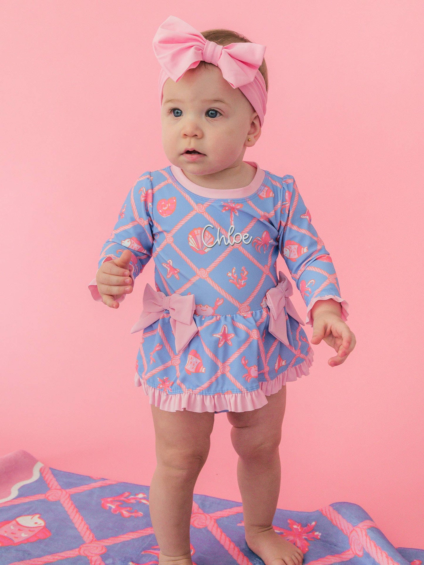 Tropical Trellis Long Sleeve One Piece Bow Peplum Rash Guard Swimsuit with Signature Rear Ruffles