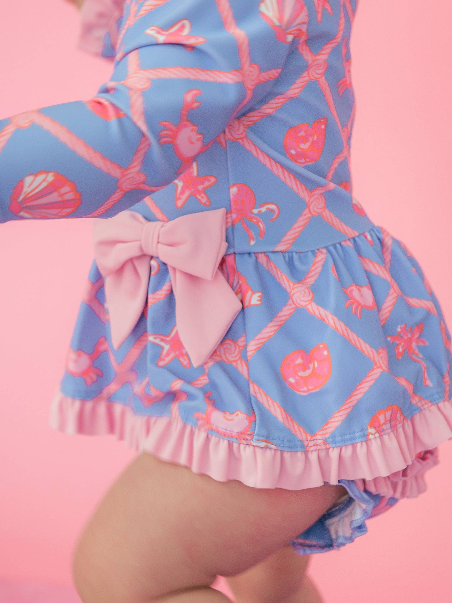 Tropical Trellis Long Sleeve One Piece Bow Peplum Rash Guard Swimsuit with Signature Rear Ruffles